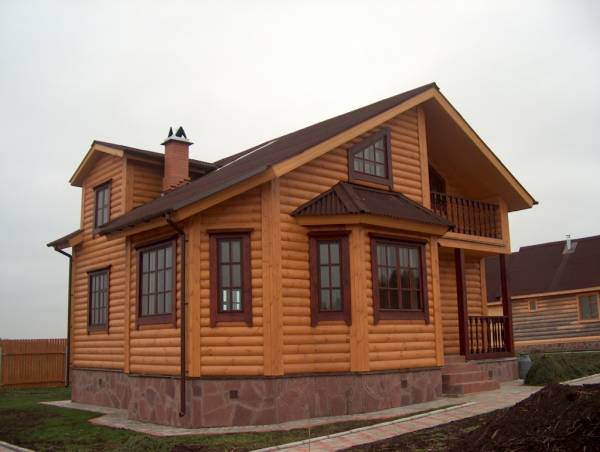 Bardage de façade avec un blockhaus Bardage de façade avec un blockhaus