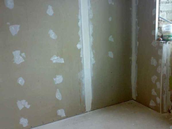 Photo d'une section d'un mur avec des joints scellés Photo d'une section d'un mur avec des joints scellés