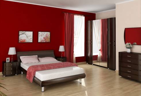 Sur la photo, une chambre rouge vif avec l'ajout d'accents noirs et blancs Sur la photo, une chambre rouge vif avec l'ajout d'accents noirs et blancs