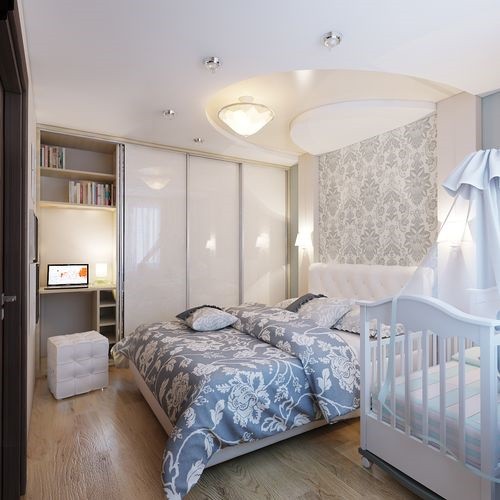 Chambre des parents avec berceau et espace de travail caché Chambre des parents avec berceau et espace de travail caché