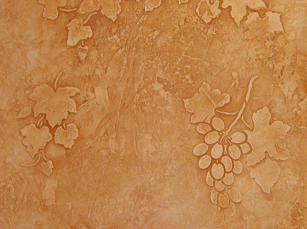 Plâtre de sgraffite, motif à l'aide d'un pochoir Plâtre de sgraffite, motif à l'aide d'un pochoir