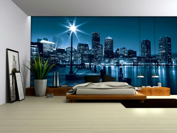 Des peintures murales fluorescentes à l'intérieur d'une chambre moderne peuvent remplacer l'éclairage nocturne et créer une atmosphère romantique dans la pièce Des peintures murales fluorescentes à l'intérieur d'une chambre moderne peuvent remplacer l'éclairage nocturne et créer une atmosphère romantique dans la pièce