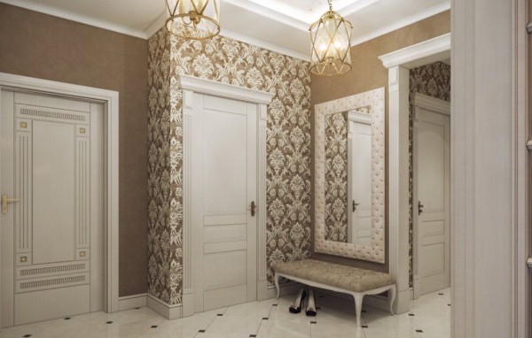 La combinaison de papier peint avec un motif et de murs peints. Une nuance importante dans ce cas est le strict respect de la gamme de couleurs qui domine le reste des nuances. La combinaison de papier peint avec un motif et de murs peints. Une nuance importante dans ce cas est le strict respect de la gamme de couleurs qui domine le reste des nuances.