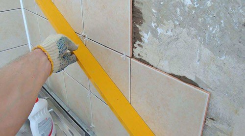 Pose de carreaux sur un mur de gvl Pose de carreaux sur un mur de gvl