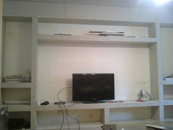 Avec l'aide d'un cadre correctement construit pour une conception en plaque de plâtre, vous pouvez facilement créer un intérieur design inhabituel et créer un espace de stockage supplémentaire Avec l'aide d'un cadre correctement construit pour une conception en plaque de plâtre, vous pouvez facilement créer un intérieur design inhabituel et créer un espace de stockage supplémentaire